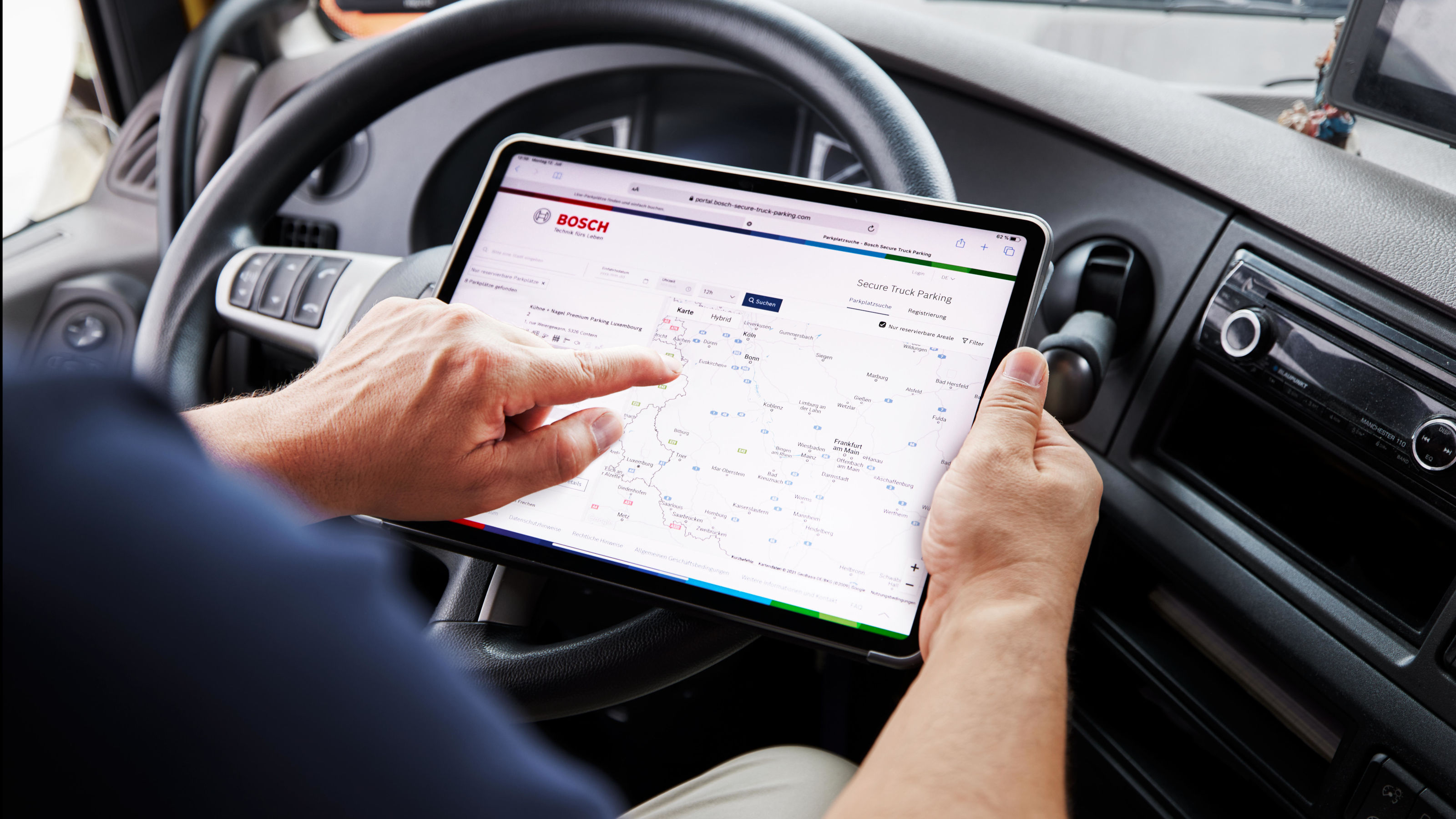 Operator checking site status on tablet